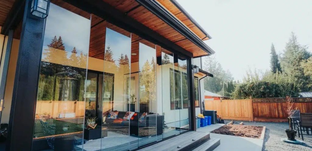 Creating Seamless Indoor Outdoor Living with Glass Walls